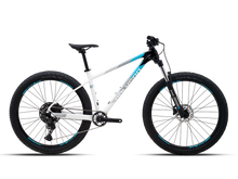Polygon Xtrada 5 mountain bike with white, blue, and black accents.