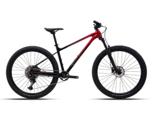 Complete Polygon Xtrada 6 bicycle, highlighting its frame color and features.