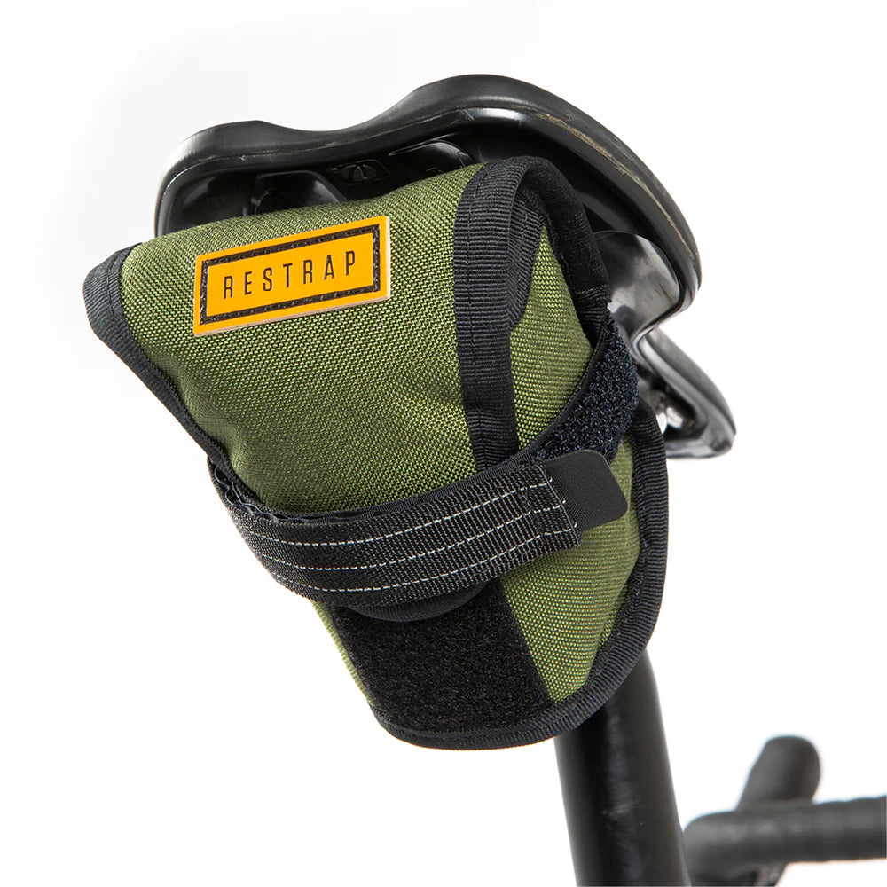 Universal fit tool pouch mounted on bicycle