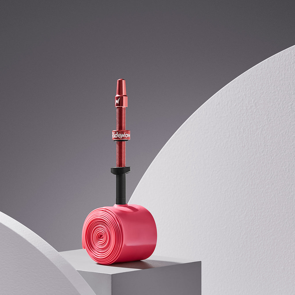 RideNow 700x18-32c Light TPU Inner Tube with aluminum valve installed in a road bike tire, demonstrating its perfect fit for 18-32c width tires.