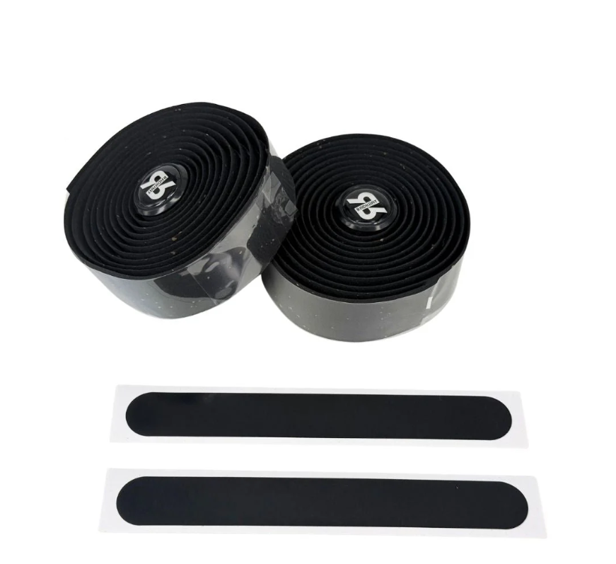Radkaat EVA-Cork Bar Tape in black blends EVA foam and natural cork for comfort, vibration damping, and a non-slip grip. Includes bar end plugs.