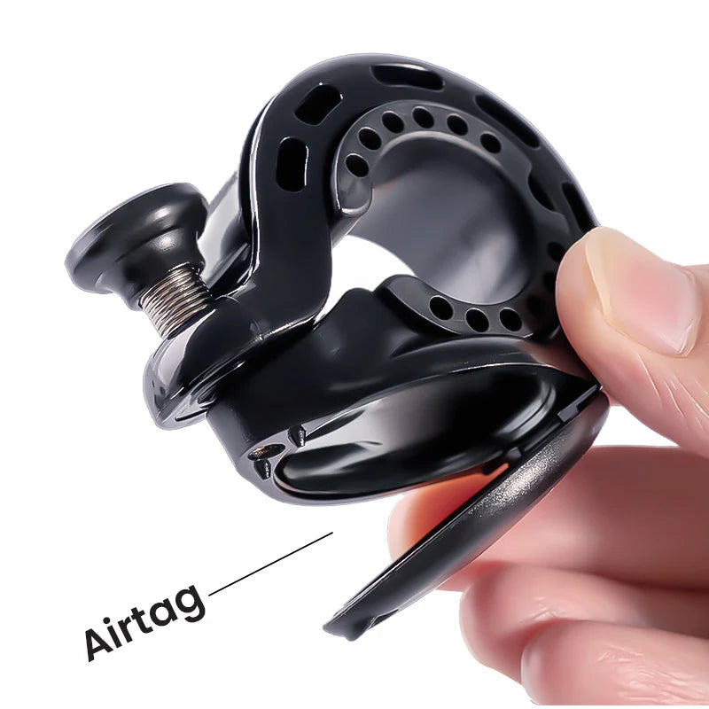 Ravemen Q2 bicycle bell accessory with AirTag holder