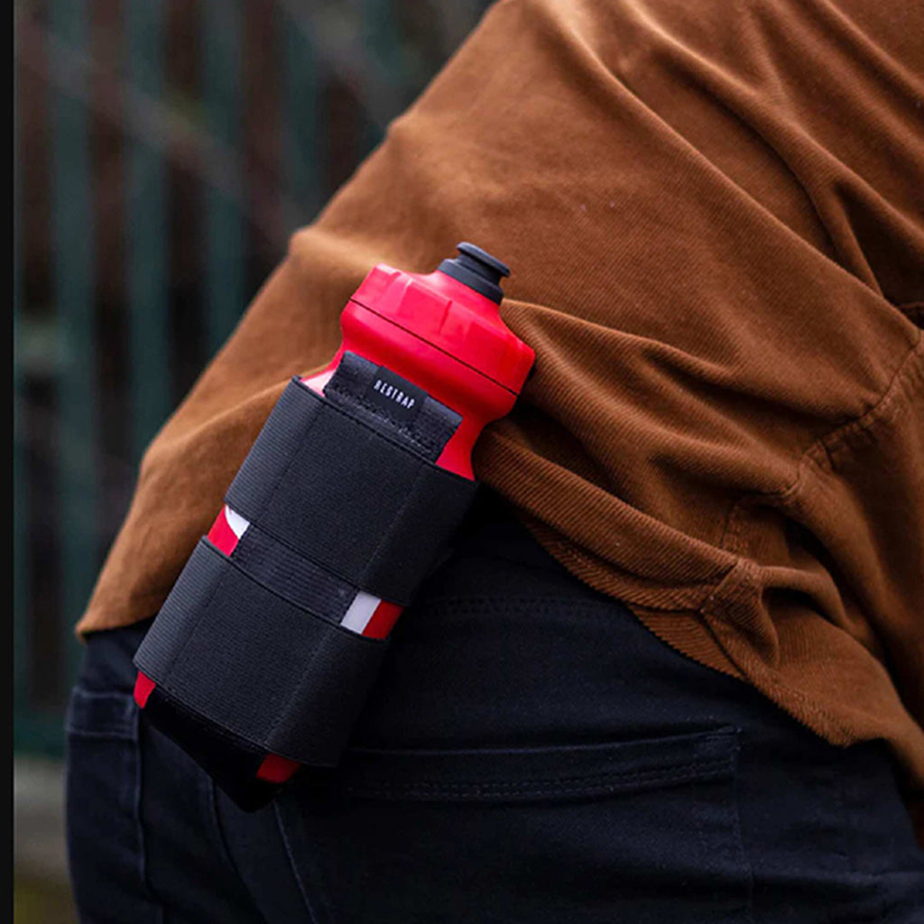 Secure cycling bottle holder with pull cord system