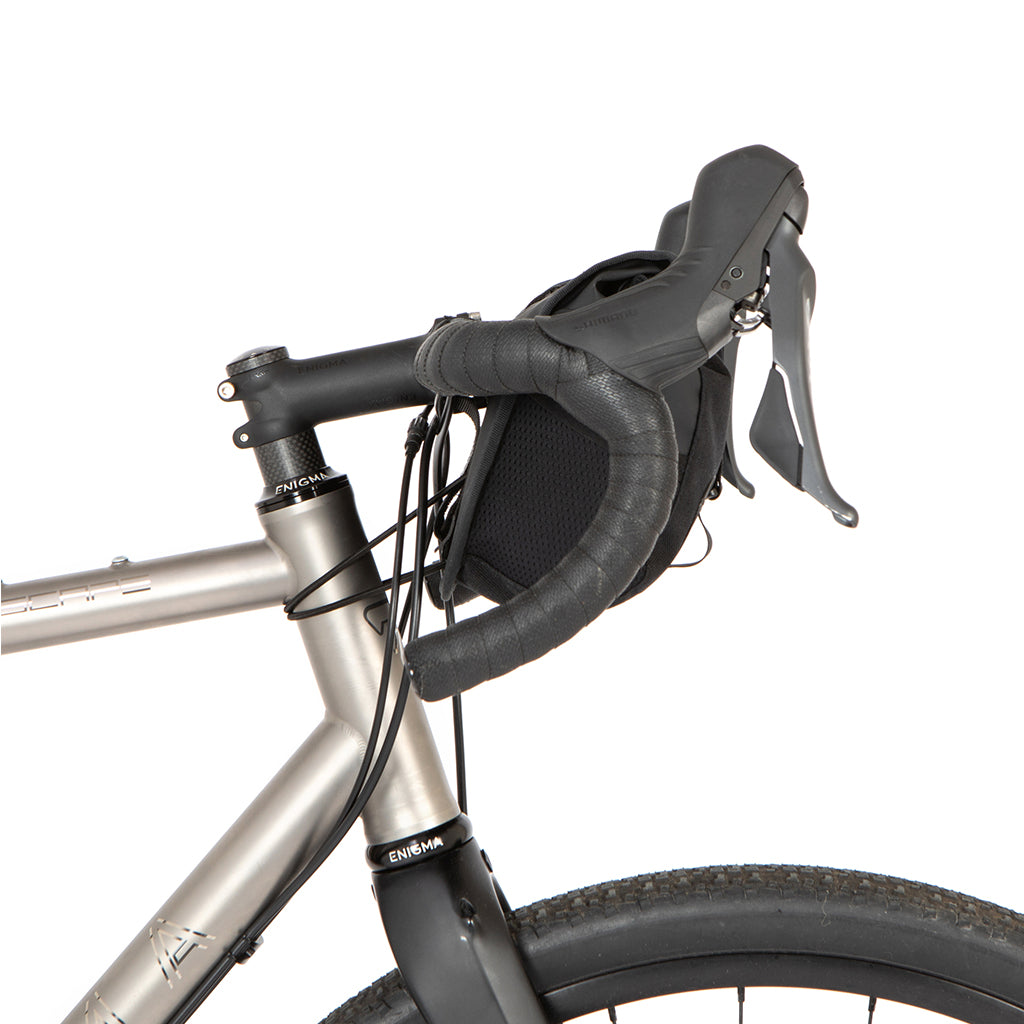 Restrap rolltop canister bag with mesh side pockets