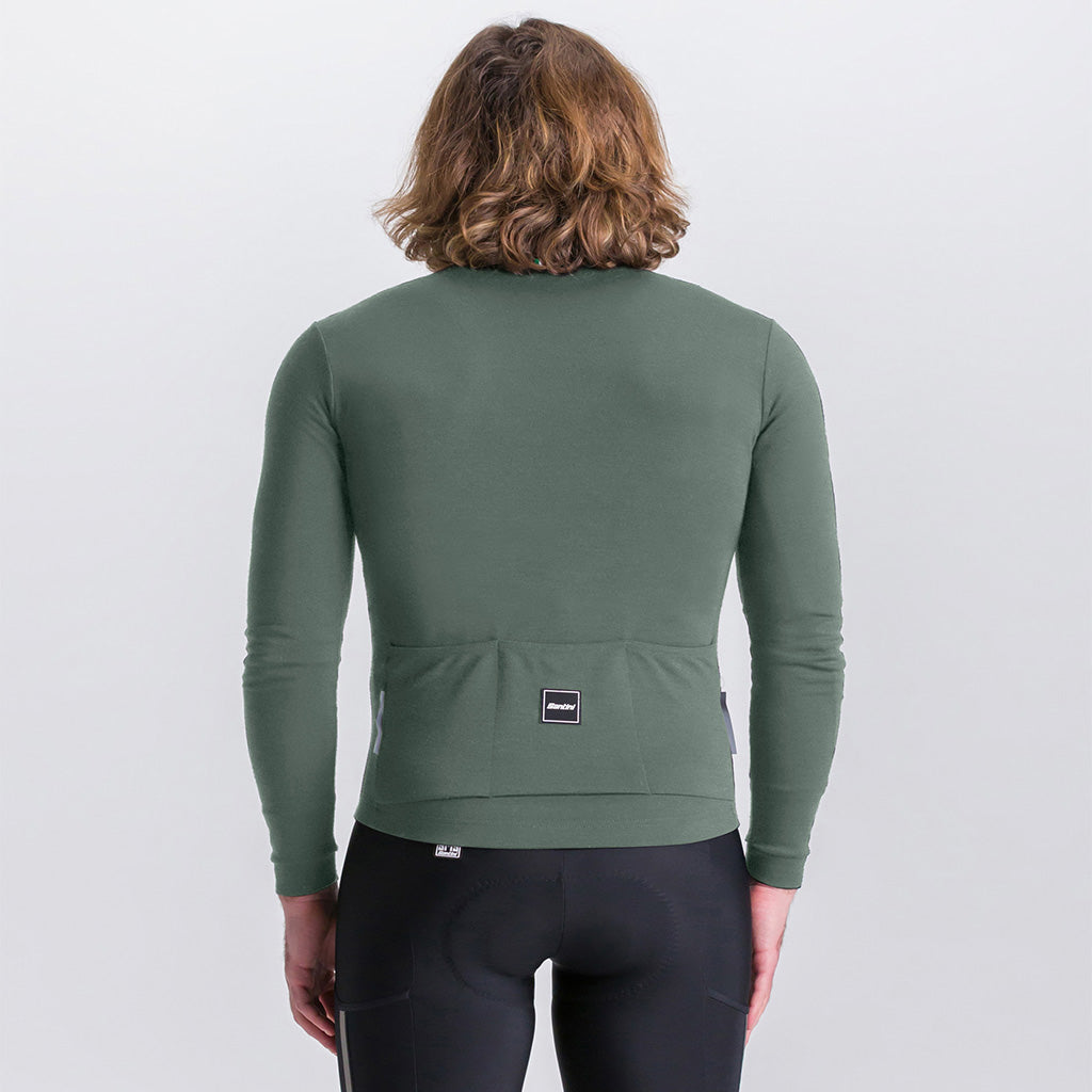 Cyclist wearing Santini Impetus Military Green long sleeve jersey with triple back pockets