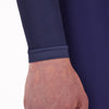 Cyclist wearing the Santini Ombra blue long sleeve jersey, showcasing its aerodynamic sleek fit and extra sun protection for arms