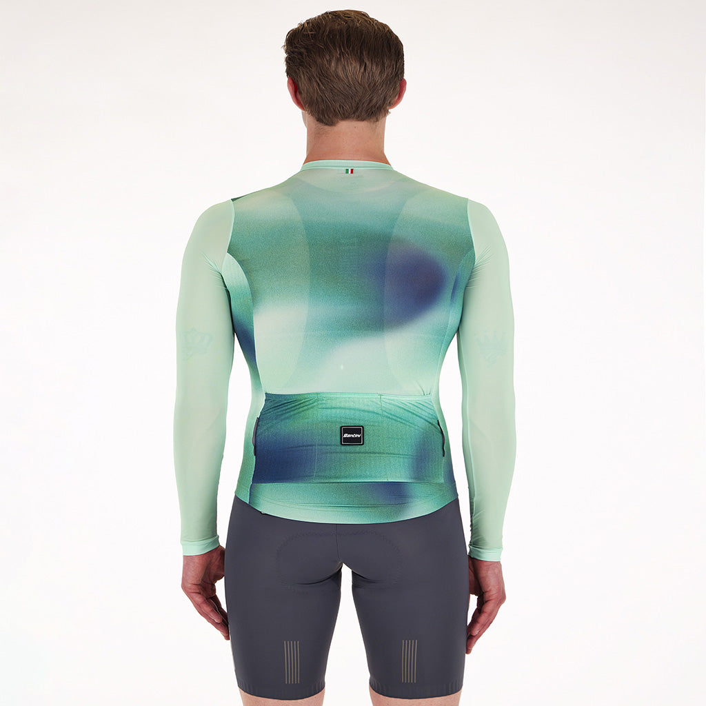 Rear view of the Santini Ombra Eco Sleek jersey in green, showing the triple back pocket and the silicon gripper for a secure, protective fit