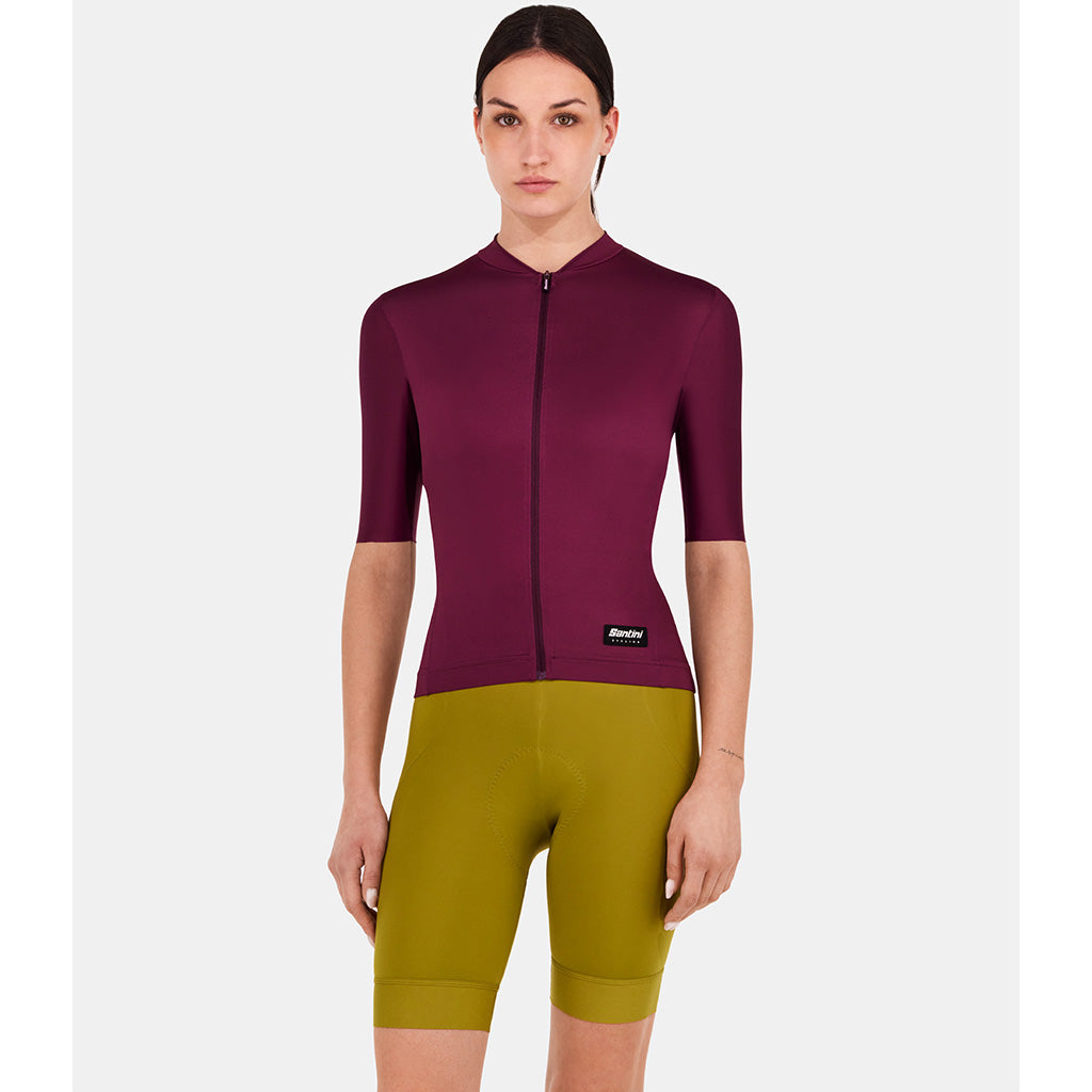 Model wearing slim fit Santini cycling jersey in Burgundy