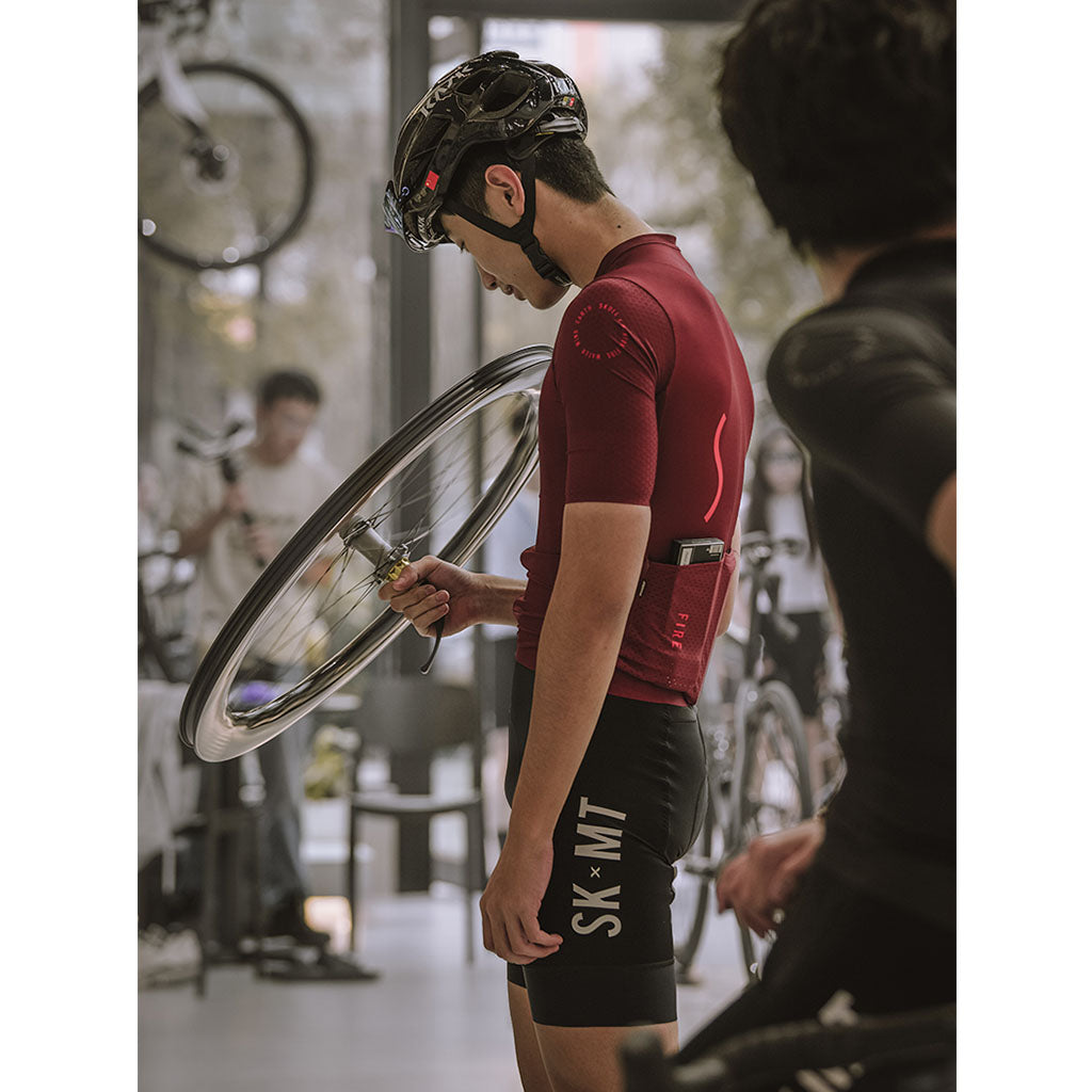 Monton red cycling jersey with warp-knitted gripper