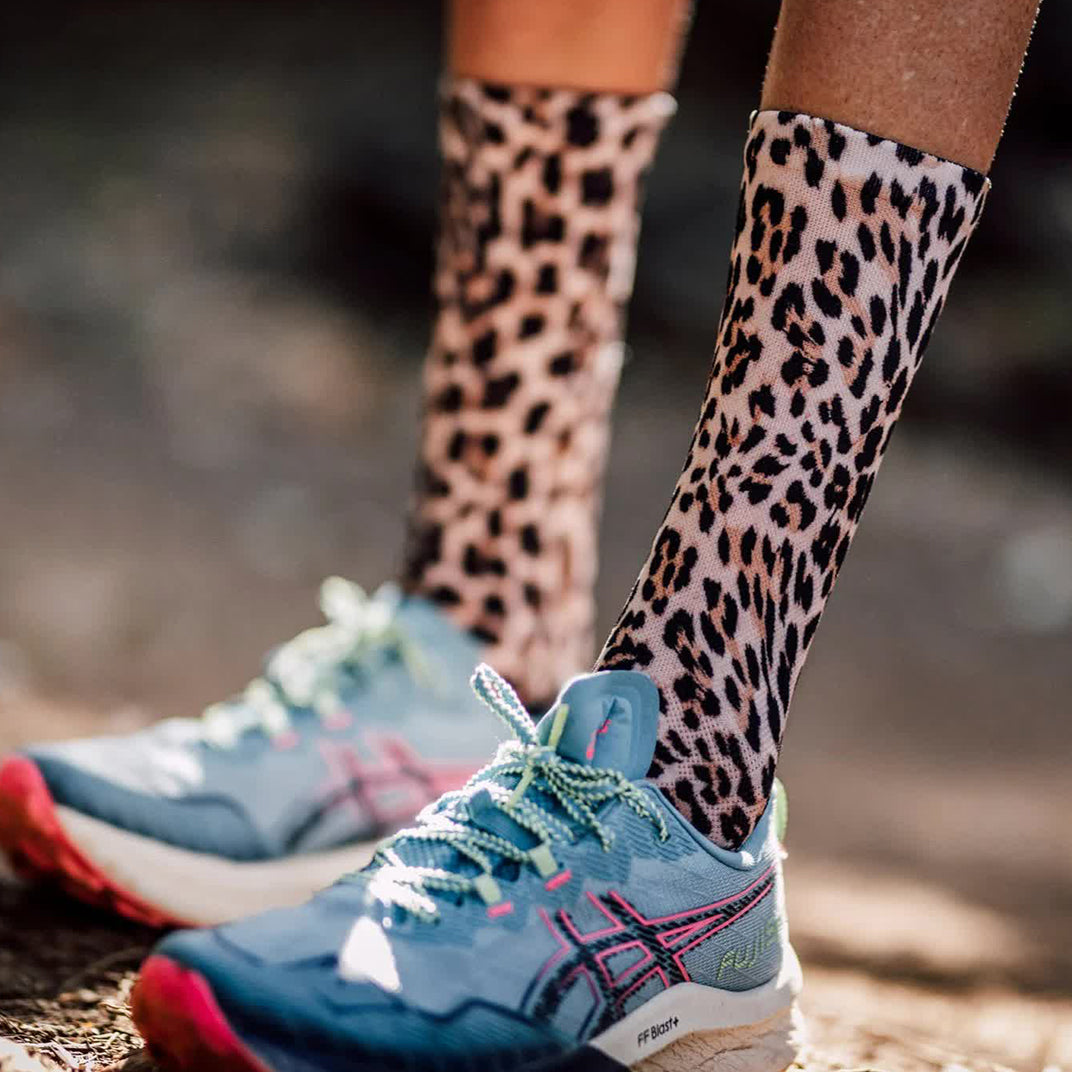 Lightweight sports crew socks with seamless toe and leopard print