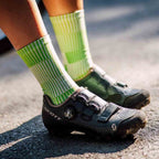Lightweight green athletic crew socks with breathable mesh fabric