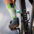 Green performance crew socks with seamless toe and reinforced heel