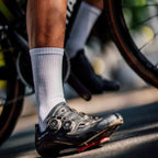 Lightweight white athletic crew socks with breathable mesh fabric