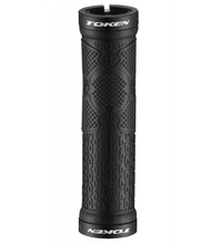  Black handlebar grips for a bike, labeled as Token MTX Lock On Grip, emphasizing cycling performance and comfort.