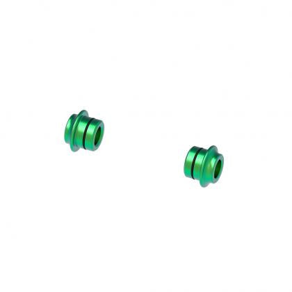 Close-up of two green metal threaded nuts against a white background, designed for TreeFrog Aluminium Plug Set for fork mounts.
