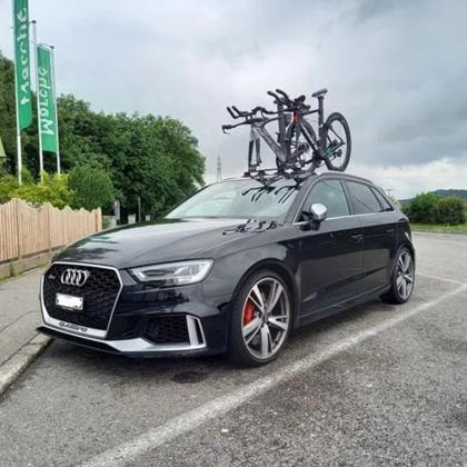 Top-down view of the TreeFrog Elite 2 Bike Rack, showcasing its six vacuum mounts and sturdy black frame for securely transporting road and gravel bikes.