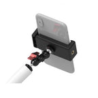  A sleek black and white TreeFrog phone holder featuring a vibrant red cord and a handy camera adapter