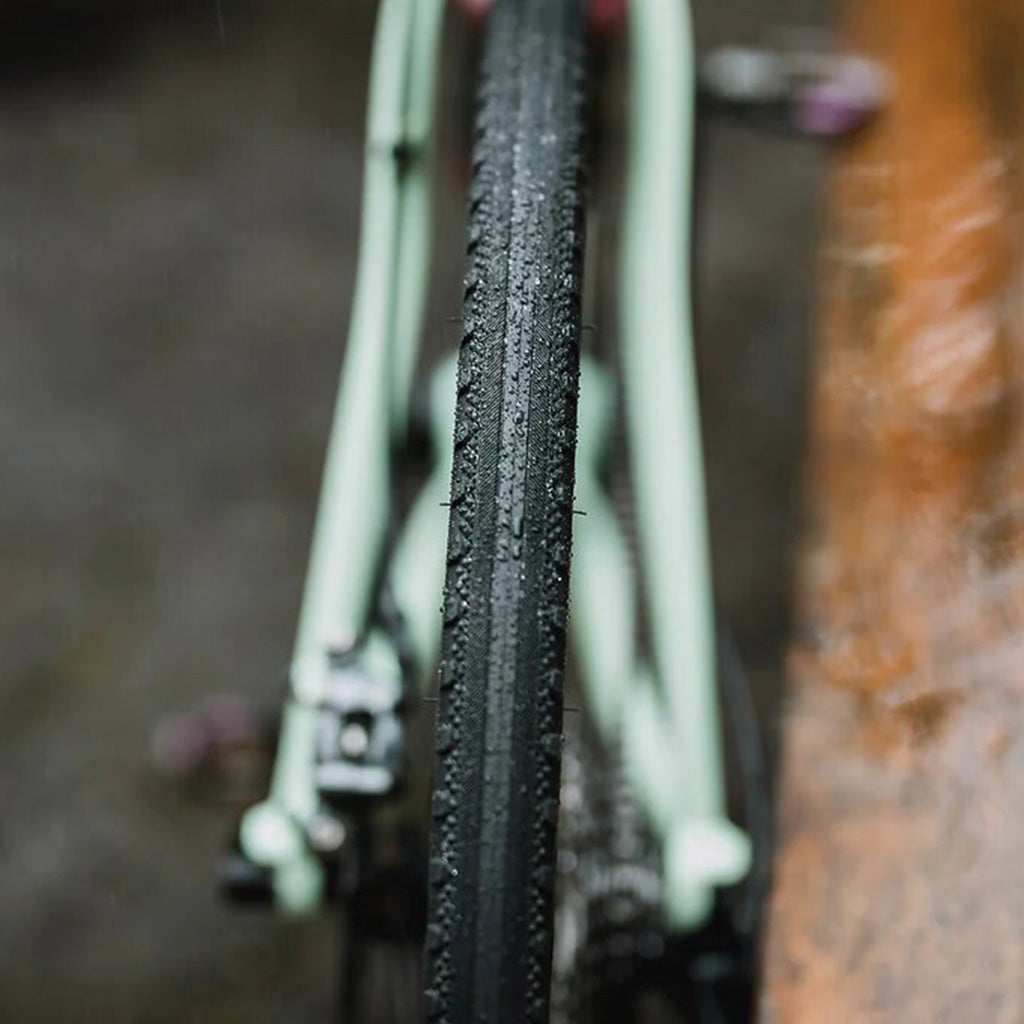 700x40c WTB Byway adventure tire with slick centerline and angular grooves

