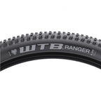 Close-up of the Ranger Comp 29x2.25 tire, showing the tightly spaced center knobs and open outer lugs for superior grip on trails.