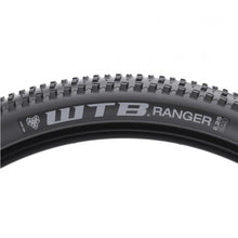 Close-up of the Ranger Comp 29x2.25 tire, showing the tightly spaced center knobs and open outer lugs for superior grip on trails.