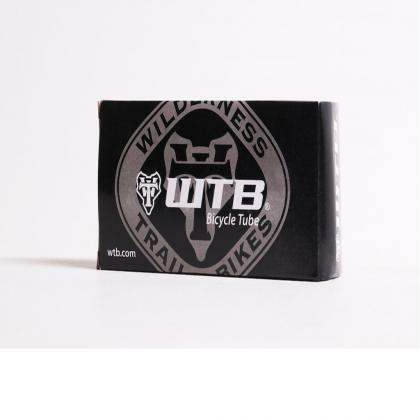 Product shot of the WTB Presta tube for 27.5 x 1.9/2.3″ tires, highlighting its 48mm valve and compact size.