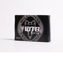 Product shot of the WTB Presta tube for 27.5 x 1.9/2.3″ tires, highlighting its 48mm valve and compact size.