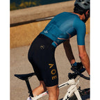 Side view of Valore Monton Nuova Luna bib shorts with AOE text