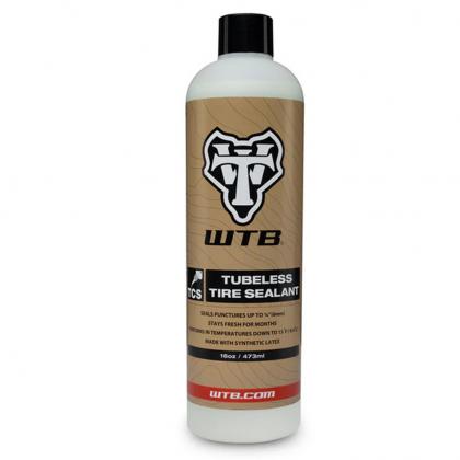 A bottle of WTB sealant, a reliable choice for cyclists who need to quickly and confidently repair tubeless tire punctures.