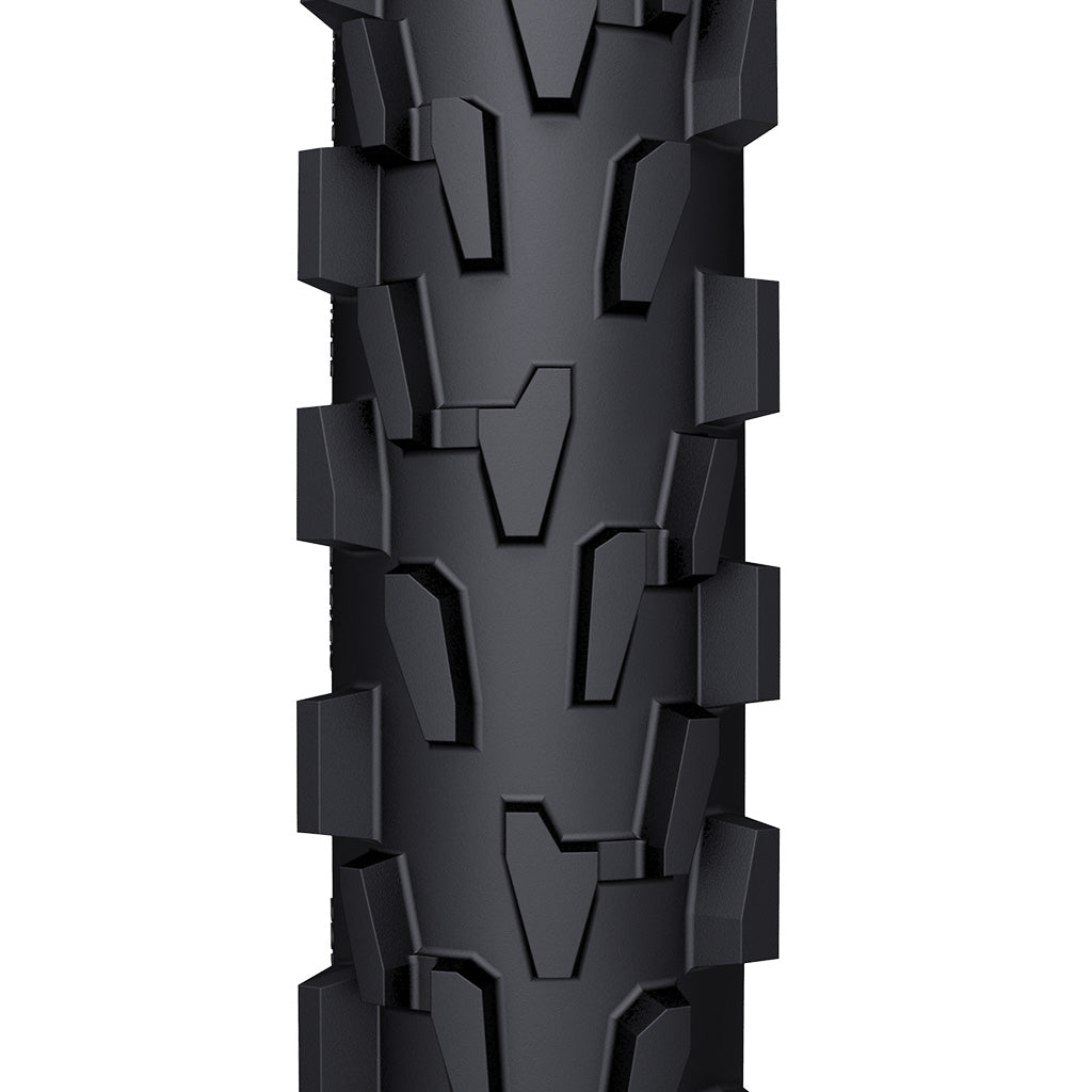 A top-down close-up of the WTB VelociRaptor Front tire, showing its specific tread pattern with directional, angled knobs.

