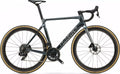 High-end aerodynamic bike used by professionals featuring the Wilier Filante SLR frameset in a carbon moongrey finish with deep-section carbon wheels and integrated cockpit.