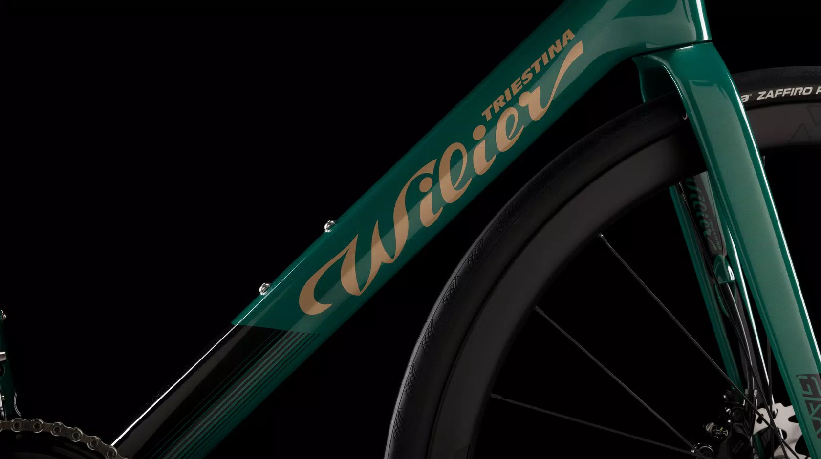 close up of a Wilier Garda Disc carbon road bike with a green frame, designed for endurance cycling.
