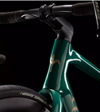Green Wilier Garda Disc carbon road bike with a black handlebar, designed for endurance cycling.
