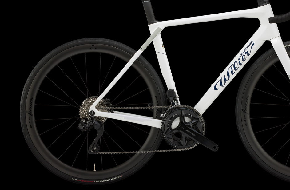 white Wilier Granturismo SL frameset, made of carbon fiber, set against a clean black  background at united by cycling.