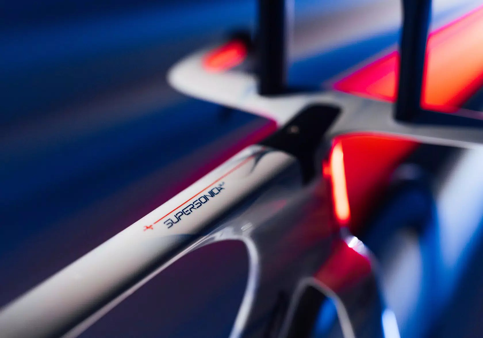 Rear view of the Wilier Supersonica SLR frameset in a studio, highlighting the integrated rear triangle and aerodynamic seatpost design.