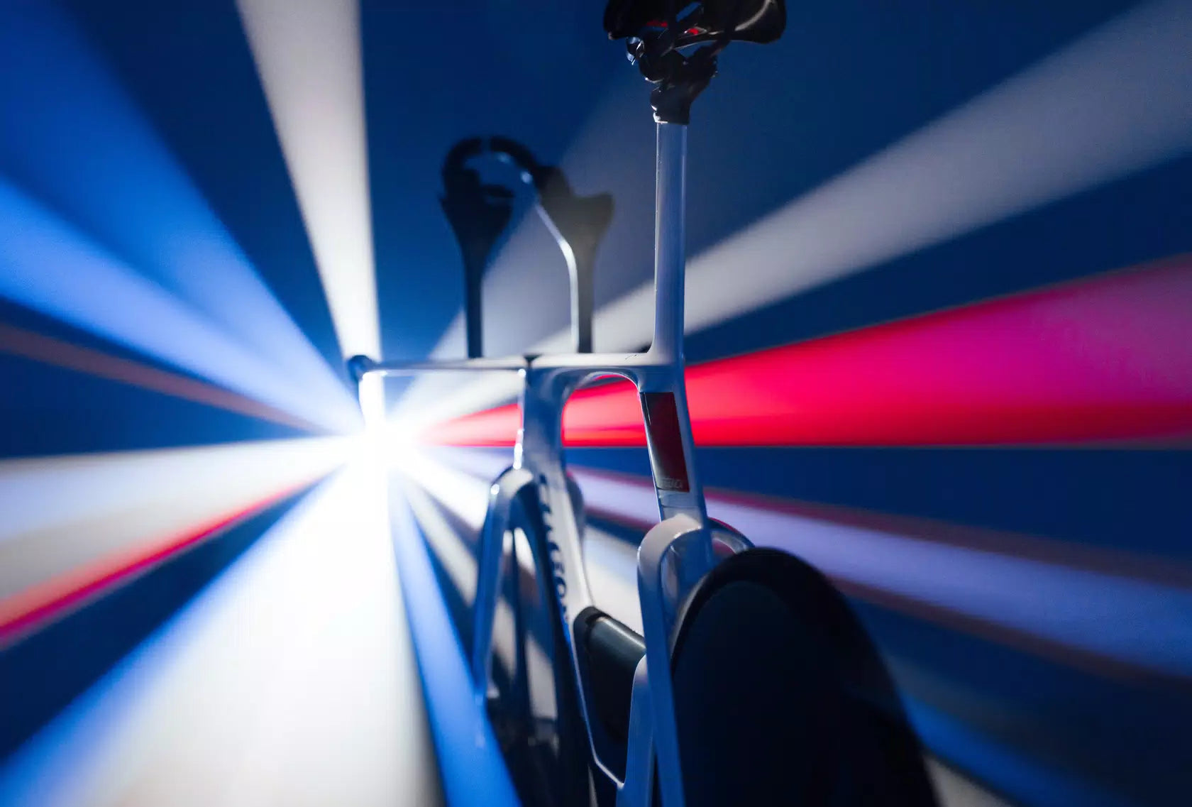 Detailed shot of the Wilier Supersonica SLR frameset's carbon fiber, revealing the intricate weave and the premium finish of the material.