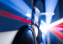 Close-up detail of the Wilier Supersonica SLR's cockpit, highlighting the integrated Profile Design ASC Pro Extensions and their ergonomic aero shaping.