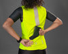 Women wearing Neon colored Gilet Sleeveless Cycling Jacket showcasing its back pocket 