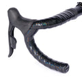 GUEE Attitude Phantom Black bartape on a bicycle handlebar, highlighting its eco-friendly, high-performance design.

