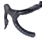 GUEE Attitude Phantom Black bartape on a bicycle handlebar, highlighting its eco-friendly, high-performance design.

