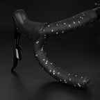 A roll of GUEE eco-friendly Attitude bartape in Styled White, emphasizing its sustainable production process and high-end feel.

