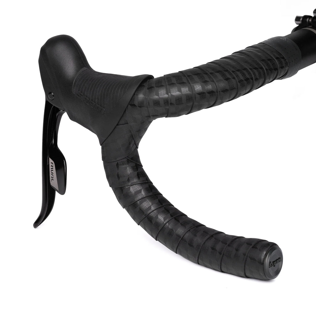 GUEE Attitude Tornado Black bar tape on a bicycle, highlighting its eco-friendly design and high-performance qualities.

