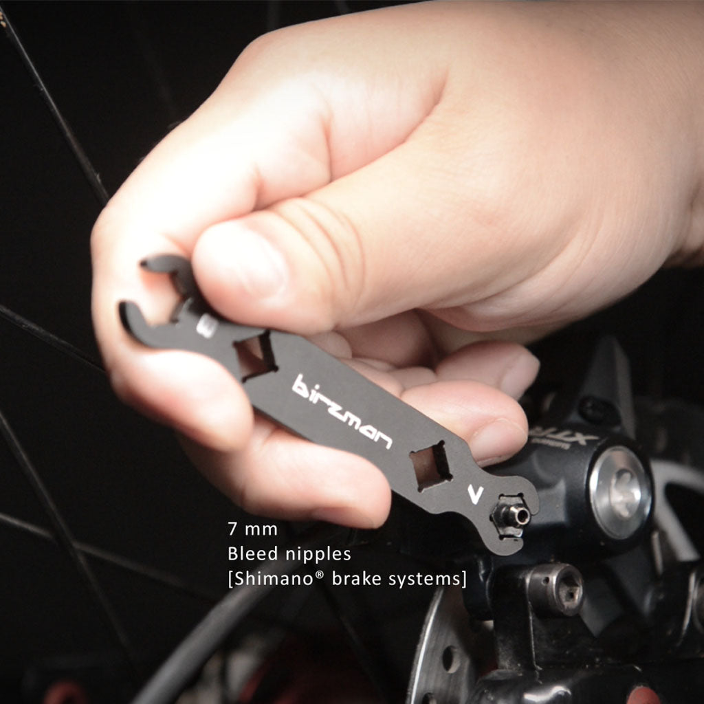 Close-up of the Birzman Flare Nut Wrench 7mm opening engaging a hydraulic brake fitting.