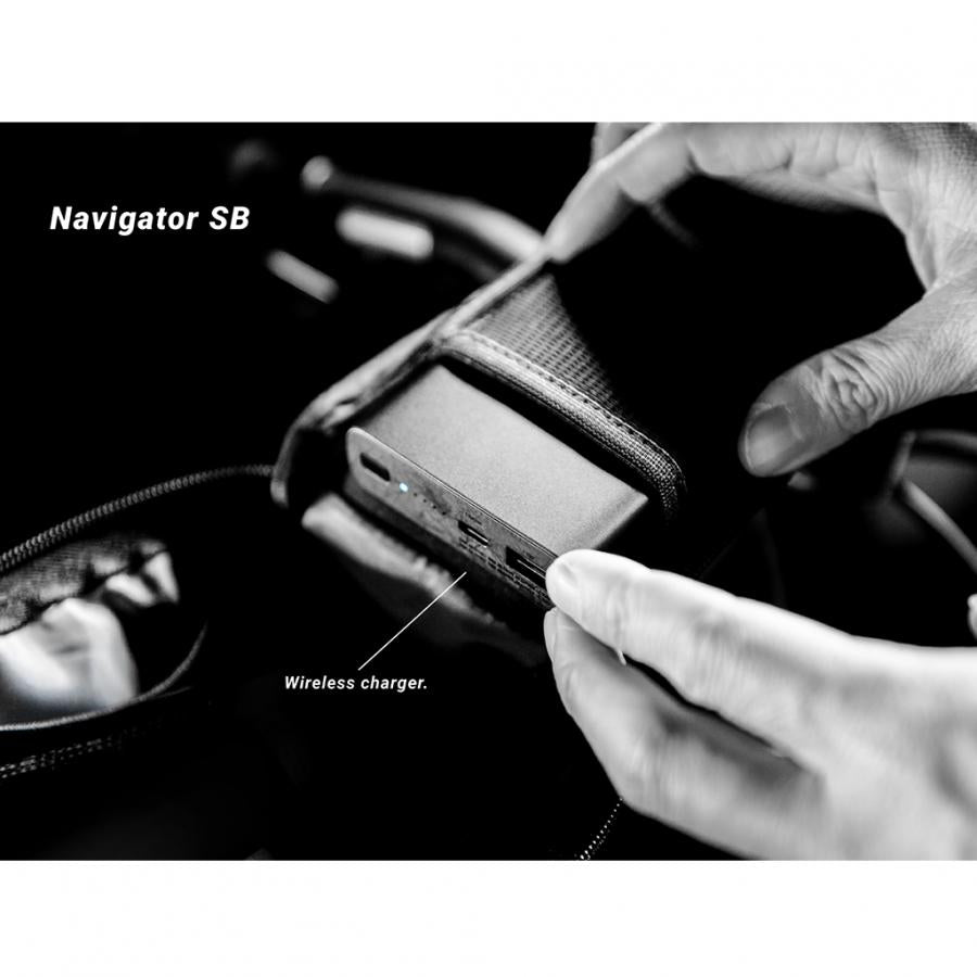 The Birzman Navigator SB Top Tube Bag shown with a smartphone visible through the touch window.