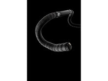 Close-up of the anti-slip 3D carbon pattern on the black bar tape

