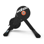 Side profile of the Wahoo KICKR CORE 2 smart trainer showing the perforated flywheel guard and KICKR CORE branded legs
