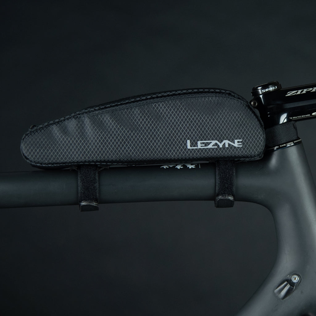 Close-up of Lezyne Aero Energy Caddy Top Tube Bag mounting straps and rivet system