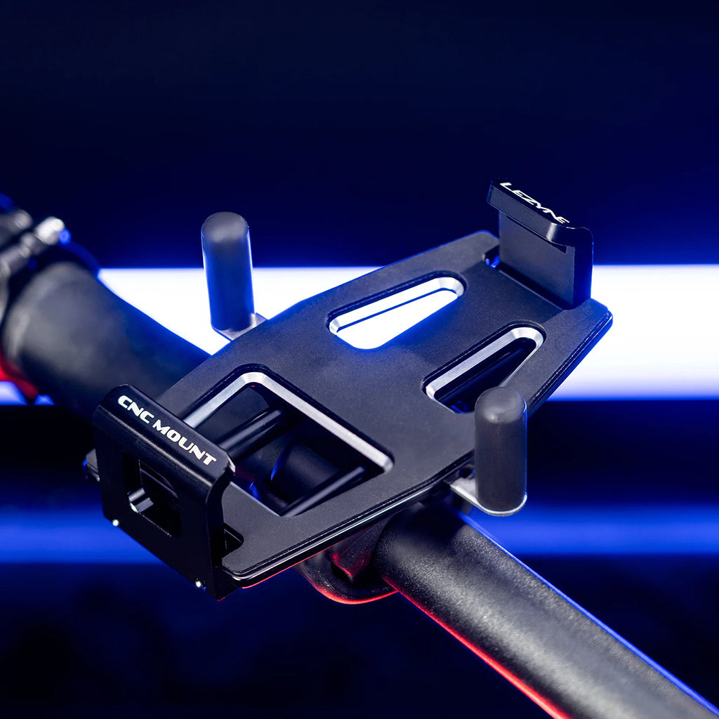 Lezyne CNC Phone Mount with phone docked on a road bike