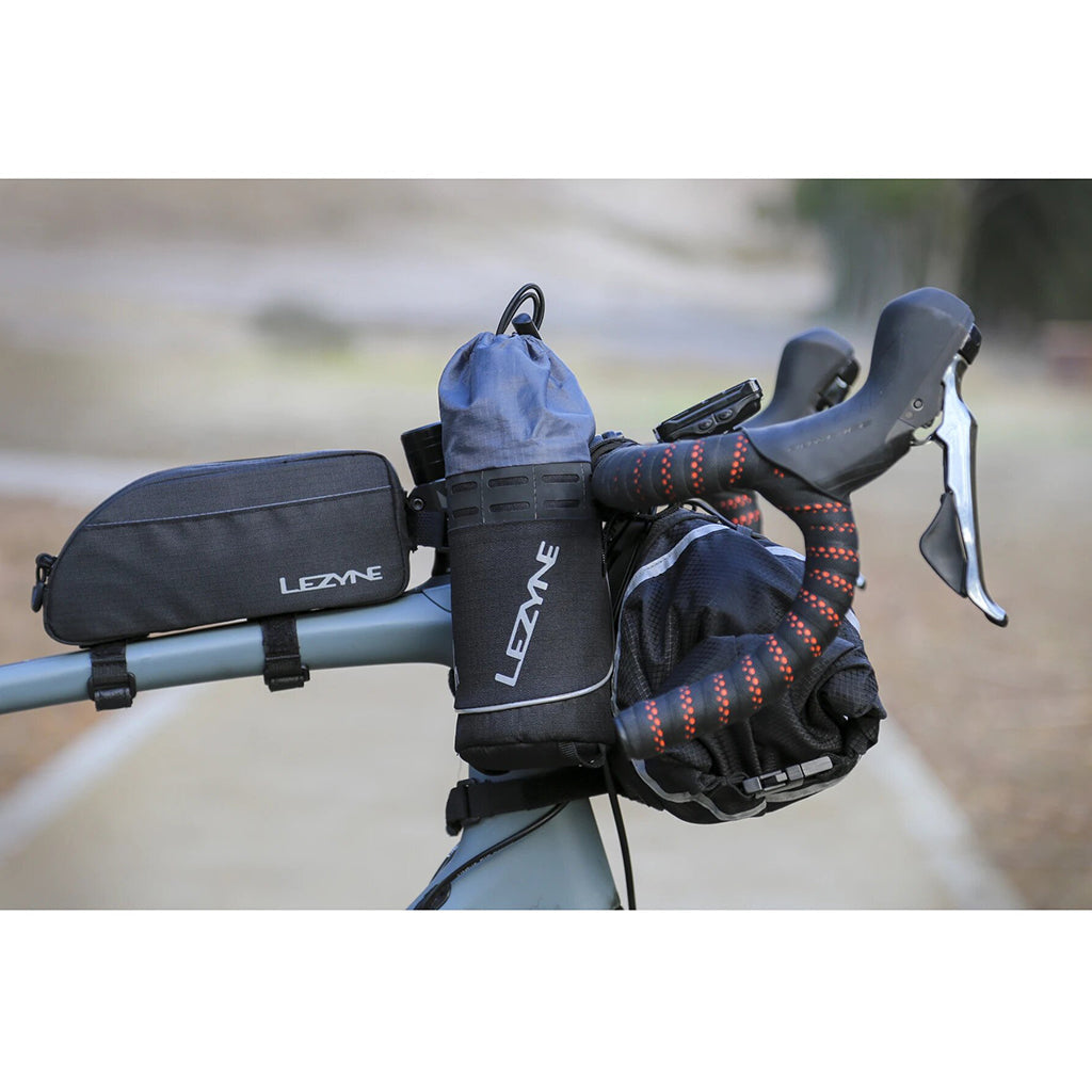 Lezyne Energy Caddy XL top tube bag holding a smartphone