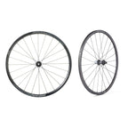 Two black Miche Reflex DX Disc road bicycle wheels on a clean white background.