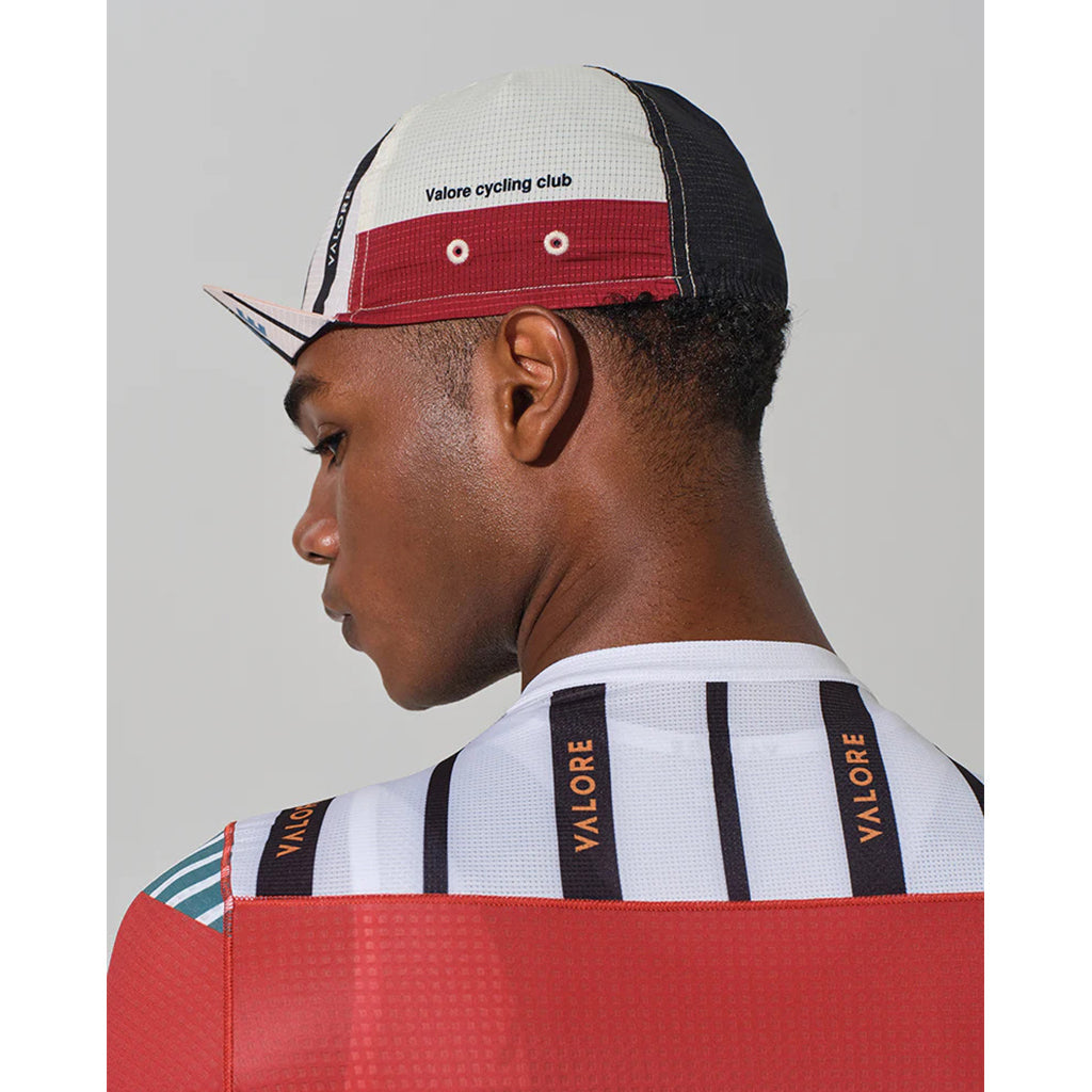 Monton Valore Linea Arte cycling cap in Stone Blue, three-quarter angle view.